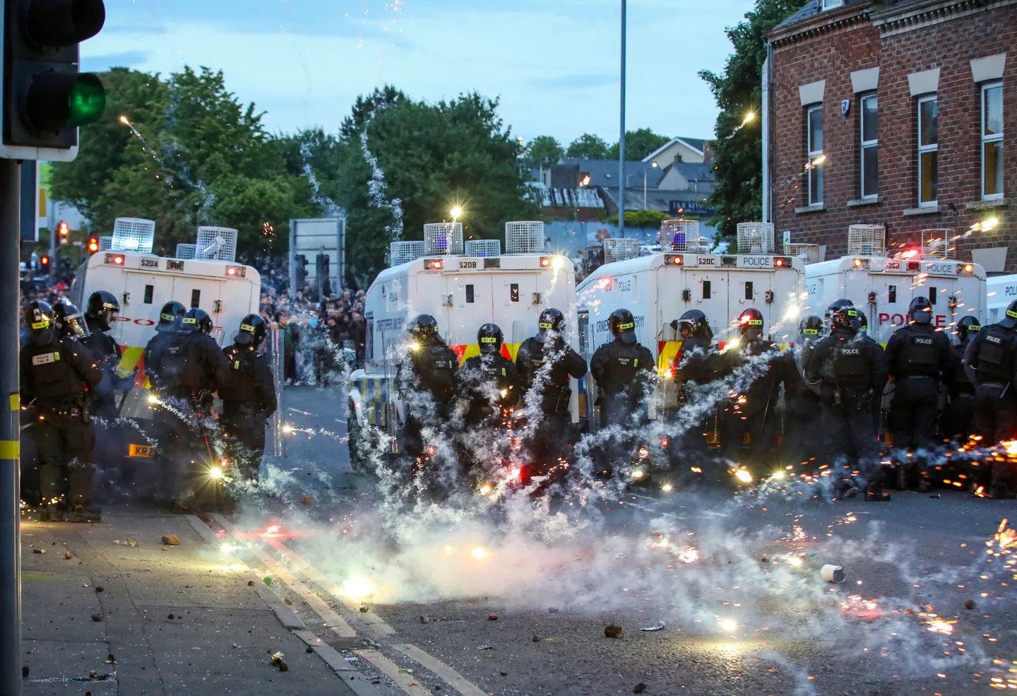 Anti-immigrant riots rock Northern Ireland for third night as protestors use petrol bombs, fireworks