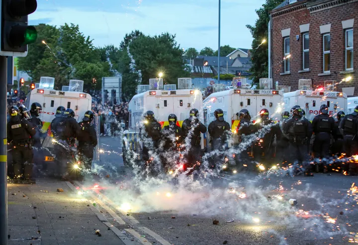 Anti-immigrant riots rock Northern Ireland for third night as protestors use petrol bombs, fireworks