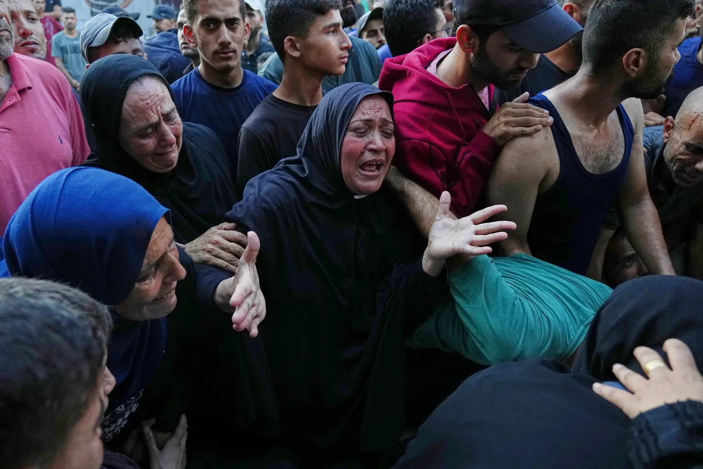 For war-weary Palestinians, life goes on under shadow of Israel-Iran conflict