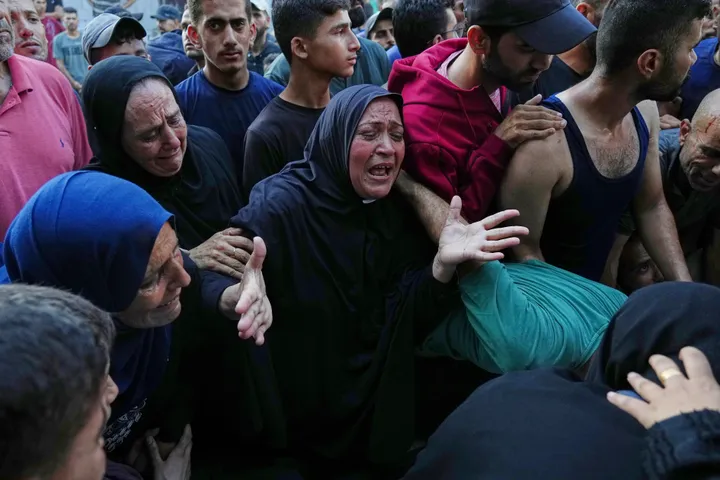 For war-weary Palestinians, life goes on under shadow of Israel-Iran conflict