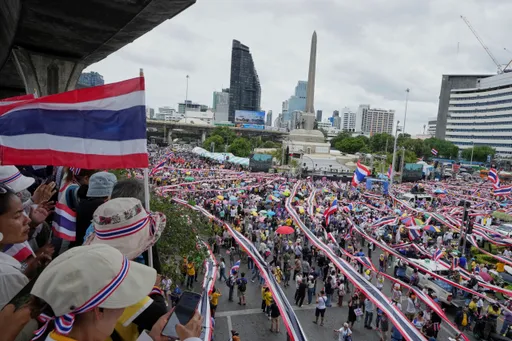 Hundreds of protesters demand the Thai premier's resignation over leaked call