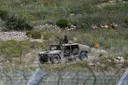 Israeli forces raid a southern Syrian town near the occupied Golan Heights in an overnight attack
