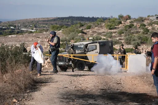 Israeli soldiers fire at Palestinian farmers during olive harvest in occupied West Bank