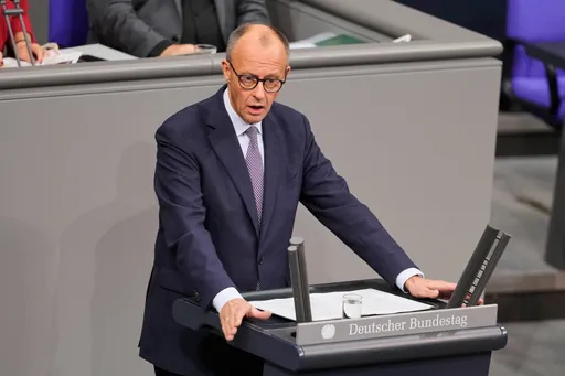German chancellor faces coalition backlash over migration comments