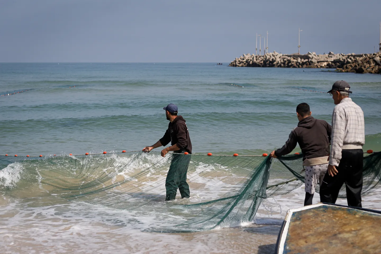 Israeli forces arrest three Palestinian fishermen, destroy boats off Gaza coast