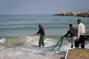 Israeli forces arrest three Palestinian fishermen, destroy boats off Gaza coast