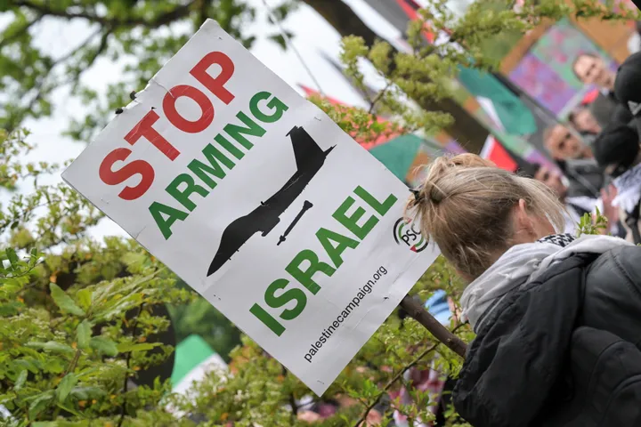 Activists chain themselves to Hamburg railway tracks to protest Germany's arms exports to Israel
