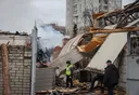 Russian missiles hit Ukrainian residential blocks, killing three: official