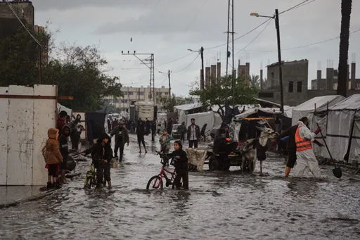Heavy rains flood dozens of tents for displaced Palestinians in southern Gaza