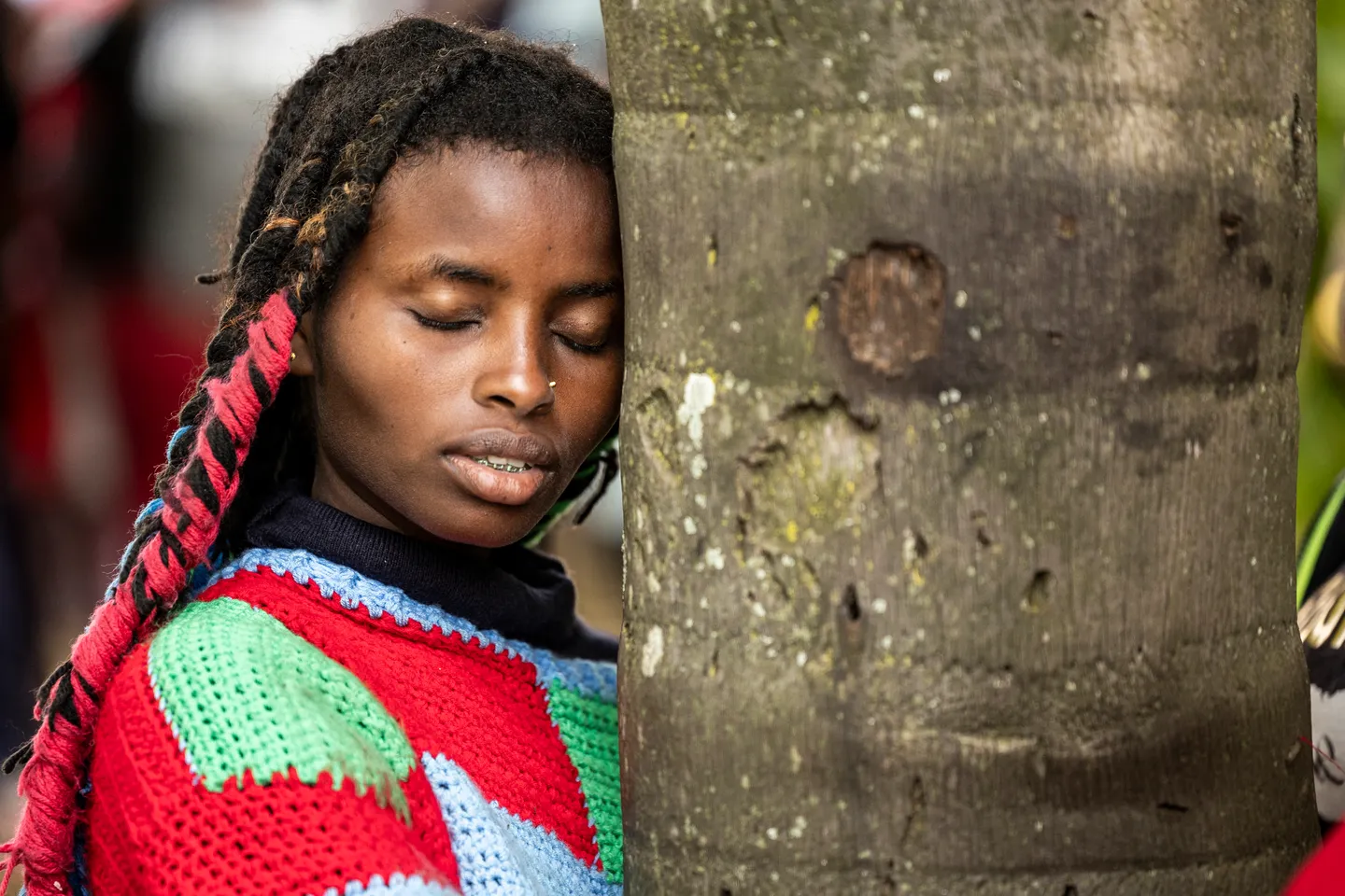 Kenyan climate activist sets world record with 72-hour tree hug to spotlight conservation