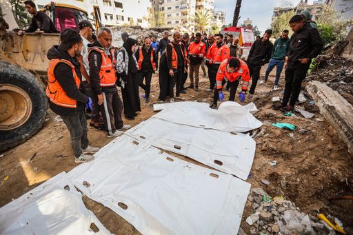 Gaza Civil Defense recovers bodies of 30 members of one family in Gaza City
