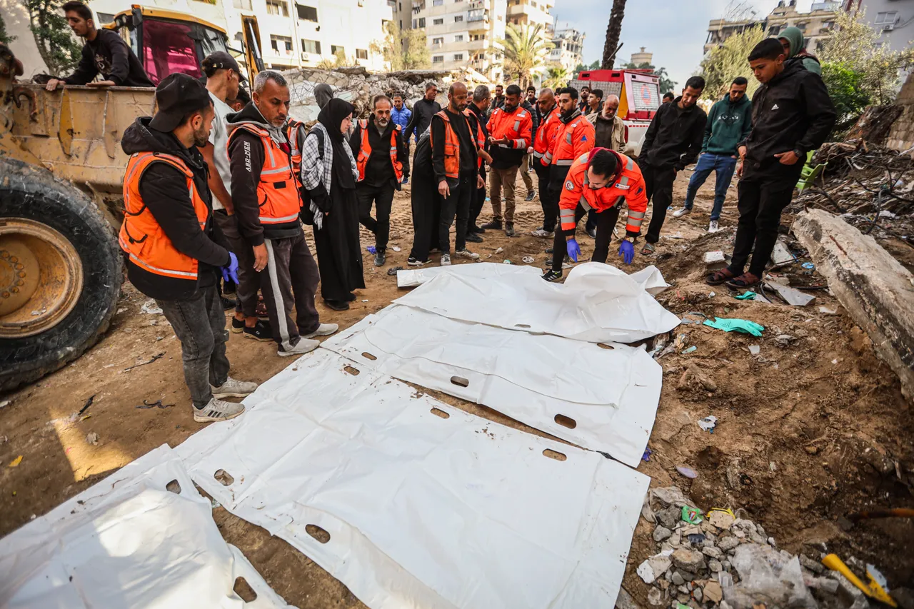 Bodies of 30 members of one Palestinian family recovered from rubble in Gaza City