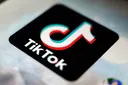 TikTok strikes venture deal to avert US ban threat