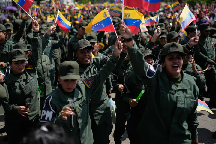 In photos: Thousands of Venezuelans take to streets to oppose US intervention