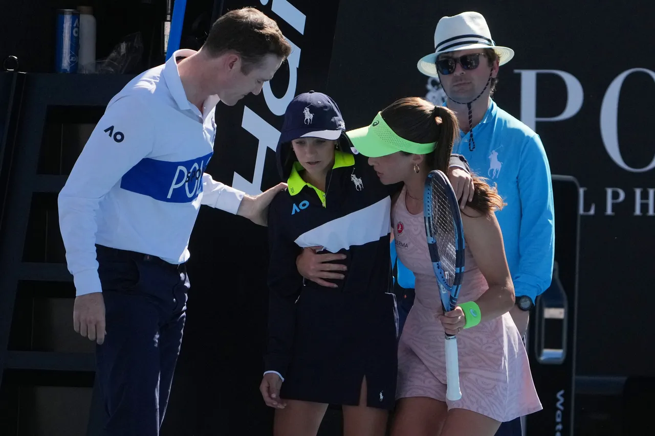 Türkiye's Zeynep Sonmez rushes to aid ballkid during Australian Open win