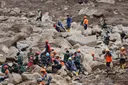 Indonesia landslide death toll rises to at least 64
