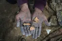 A father in Gaza searches rubble for his family's remains after Israeli air strike destroys home