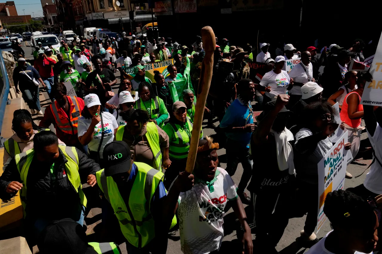 Hundreds march in South Africa anti-migrant protests as shops shut