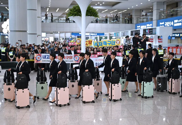 North Korean women footballers arrive in South Korea for first sports visit in eight years