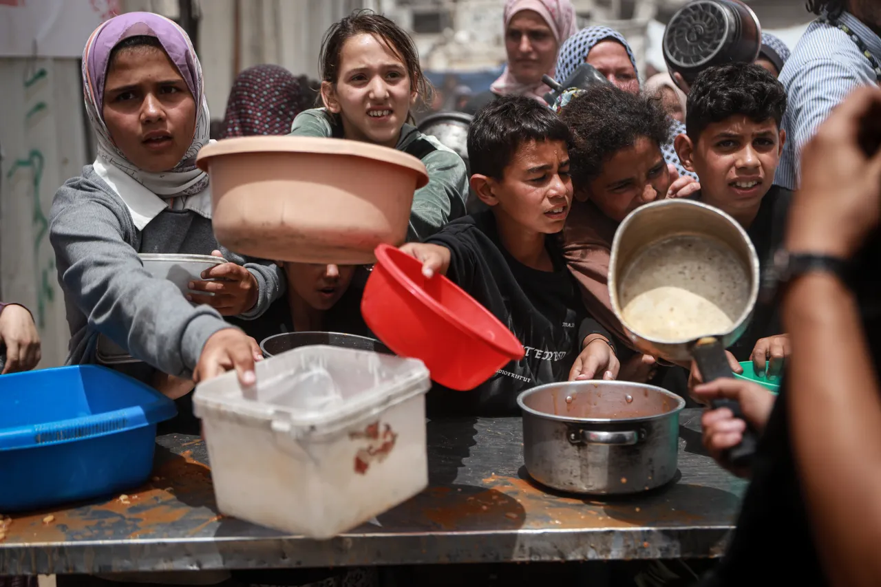 'We'll return to famine': Displaced families in Gaza protest World Central Kitchen meal cuts