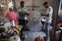 From ruins to ribbons: Young Palestinian tailor turns waste fabrics into dresses for girls