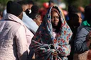 Thousands gather near South Africa-Zimbabwe border as migrant exodus grows