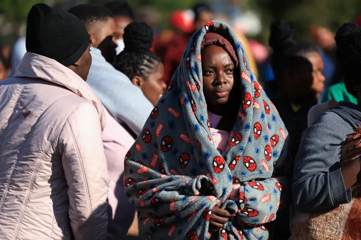 Thousands gather near South Africa-Zimbabwe border as migrant exodus grows