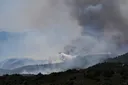 Firefighters battle fast-moving wildfires in southern France
