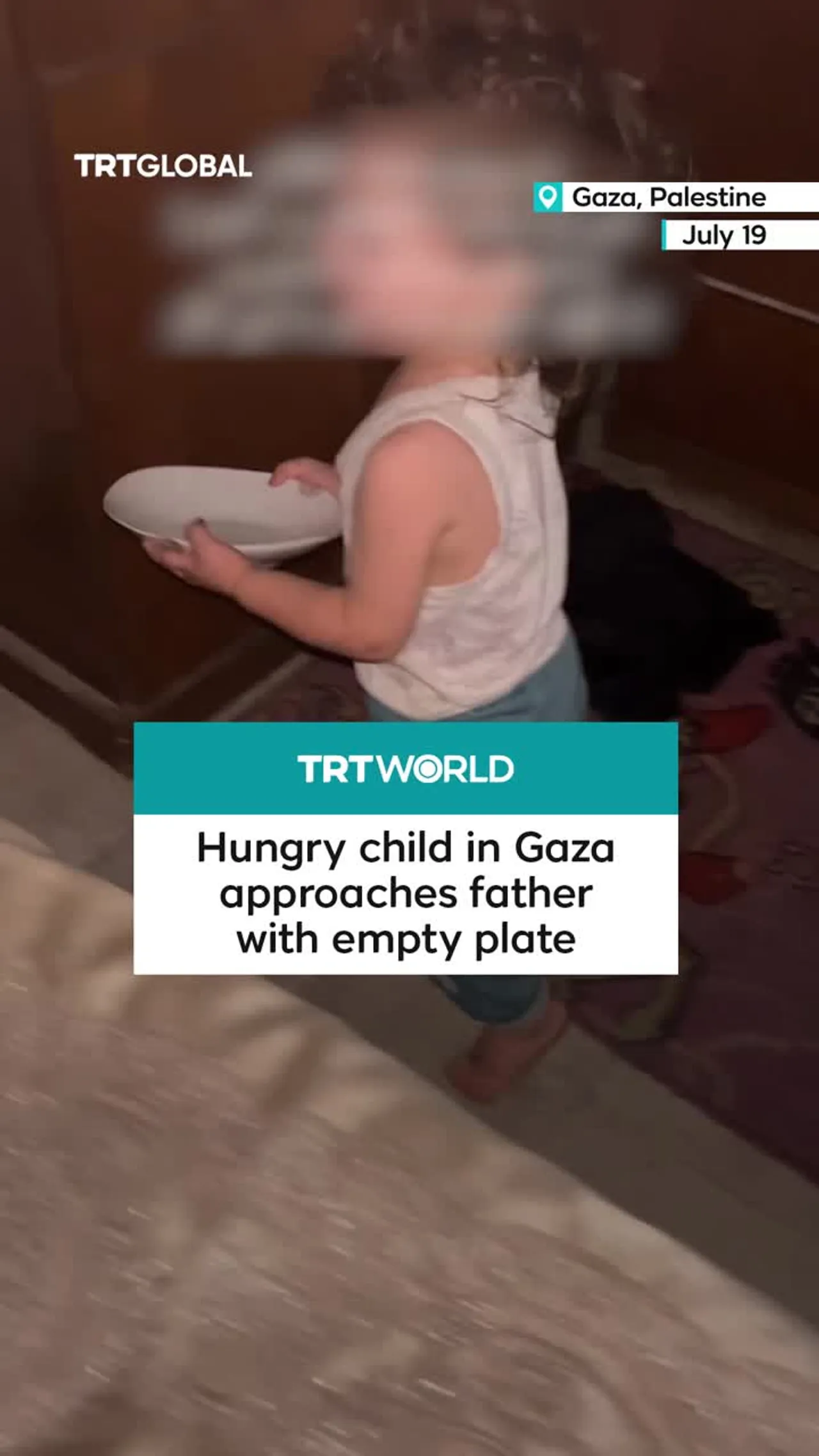 Hungry child in Gaza approaches father with empty plate